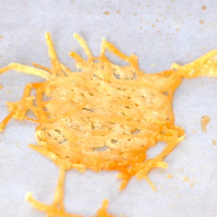 Make a simple yet impressive appetizer in minutes with these Quick and Easy Parmesan Crisps! Get the gluten-free and vegetarian recipe at JessicaLevinson.com | #healthysnacks #healthyappetizer #glutenfree Quick and Easy Parmesan Crisps on Pan