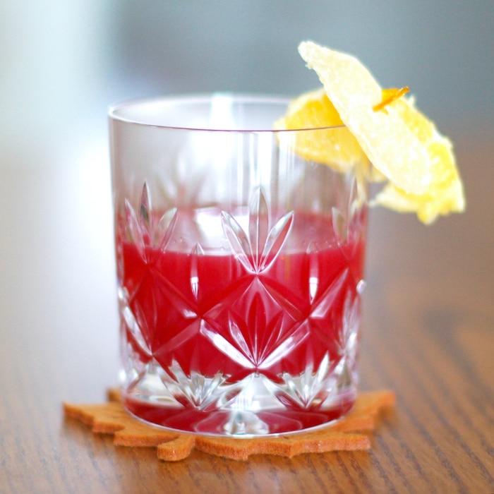 Warm up with a Cran-Toddy or stay refreshed with a Cranberry Cider Cooler - two cranberry cider cocktail recipes to enjoy all winter long! Get both recipes via JessicaLevinson.com #healthycocktails #cranberrycocktail #holidaydrinkrecipes Cranberry Cider Cocktails Cran Toddy