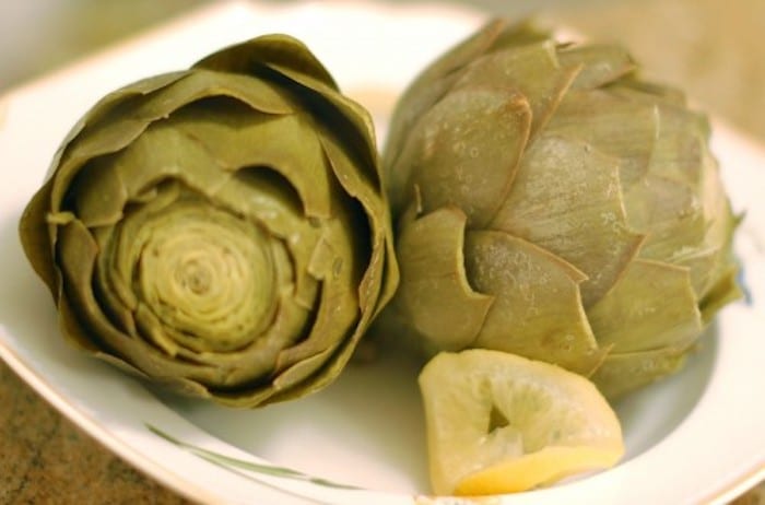 Spring is the season for beautiful artichokes, which are full of nutrition and flavor. Find out why you should love artichokes now via JessicaLevinson.com #Artichokes #SpringVegetables Love Artichokes with Garlic