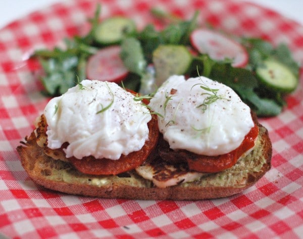 Mediterranean Style Egg & Cheese Mediterranean Style Egg & Cheese | Smoky halloumi, fragrant rosemary-garlic roasted tomatoes, and poached eggs top hearty sourdough bread in this light & lean breakfast for dinner - or anytime - recipe!