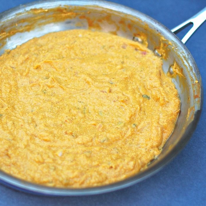 Enjoy pumpkin beyond dessert with this creamy, yogurt-based pumpkin sauce, a delicious coating for ravioli or your favorite pasta. Get the recipe at JessicaLevinson.com | #pumpkin #pumpkinspice #vegetarianrecipes #glutenfreerecipes Yogurt, pumpkin, and spices come together in this creamy fall-friendly sauce.