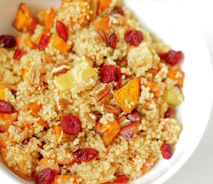 This nutritious and delicious spiced quinoa is packed with fall produce, is vegan and gluten-free, and can be made in less than 30 minutes! Get the recipe via @JessicaLevinson.com #FallSideDish #HealthyQuinoaRecipe Spiced Quinoa Close Up
