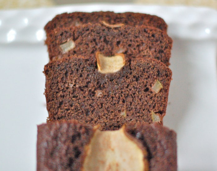 Chocolate pear bread is easy to make and a delicious flavor combination. Perfect for weekend brunch. sliced chocolate pear bread