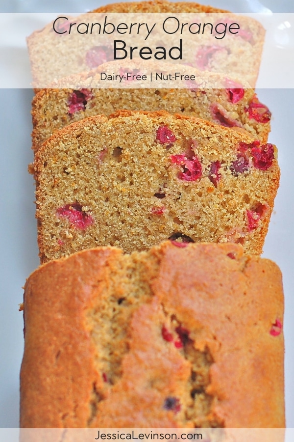 Cranberry Orange Bread | This whole-grain Cranberry Orange Bread will keep you healthy all winter long thanks to antioxidant-rich cranberries and vitamin C-rich oranges. Get this dairy-free and nut-free recipe @jlevinsonrd | #QuickBreadRecipe | #FallBaking | #QuickBreads Cranberry Orange Bread with Text Overlay