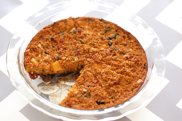 Heart-healthy oats are combined with sun-dried tomatoes, baby spinach, thyme, and creamy goat cheese in this savory baked oatmeal frittata. Recipe at JessicaLevinson.com | #GlutenFree #vegetarian #vegetarianrecipes #recipes #dinner #quickandeasy #frittata #oatmeal #savoryoats #bakedoatmeal savory baked oatmeal quick and easy dinner