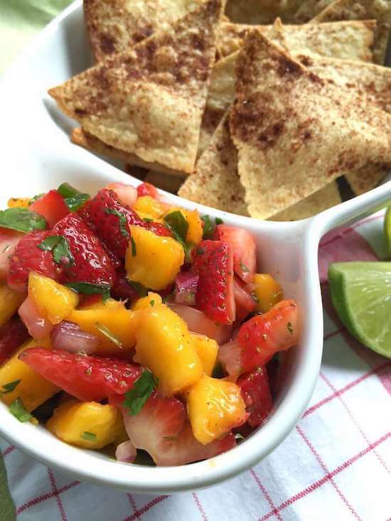 50+ delicious and healthy homemade picnic recipes that are perfect for enjoying the beautiful days of spring and summer outdoors with your family! Get the recipe roundup at JessicaLevinson.com #healthypicnicrecipes #picnicrecipes Homemade Picnic Recipes Strawberry Mango Salsa