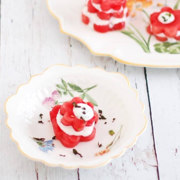 Watermelon ricotta stacks make for a festive, nutritious and delicious summer appetizer or hors d'oeuvres. Get the recipe at JessicaLevinson.com | #SummerAppetizers #WatermelonRecipes Watermelon Ricotta Stack on Plate