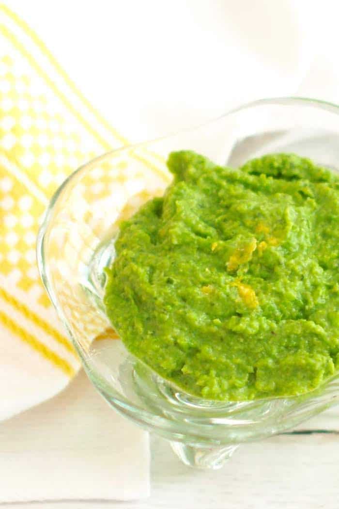 This bright and refreshing 3 Ingredient Minty Pea Dip is quick and easy to make and can be used in a variety of ways. Get this Vegan and Gluten-Free Recipe via JessicaLevinson.com #HealthyDipRecipe #SpringPeaRecipes #SpringRecipe Minty Pea Dip Recipe Closeup