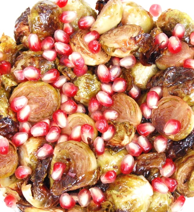 Roasted Brussels Sprouts with Pomegranate Glaze | Jessica Levinson, MS, RDN, CDN close up of roasted brussels sprouts