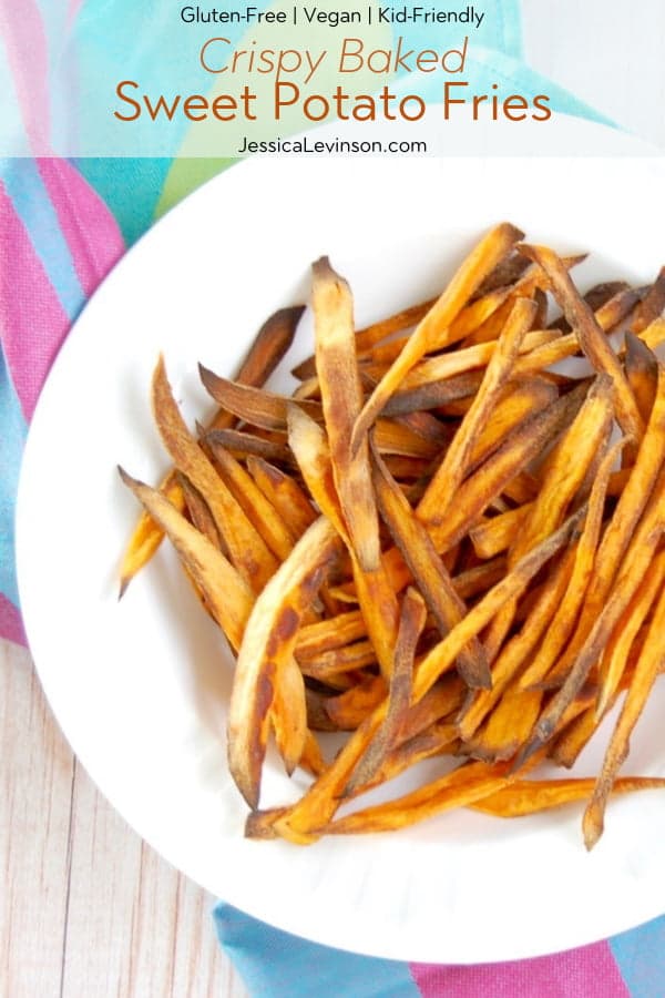Crispy baked sweet potato fries are easy to make, kid-friendly, and delicious. The perfect side dish for any weeknight family dinner! Get the recipe at JessicaLevinson.com #HealthySweetPotatoFries #BakedSweetPotatoFriesRecipe Crispy Baked Sweet Potato Fries with Text Overlay