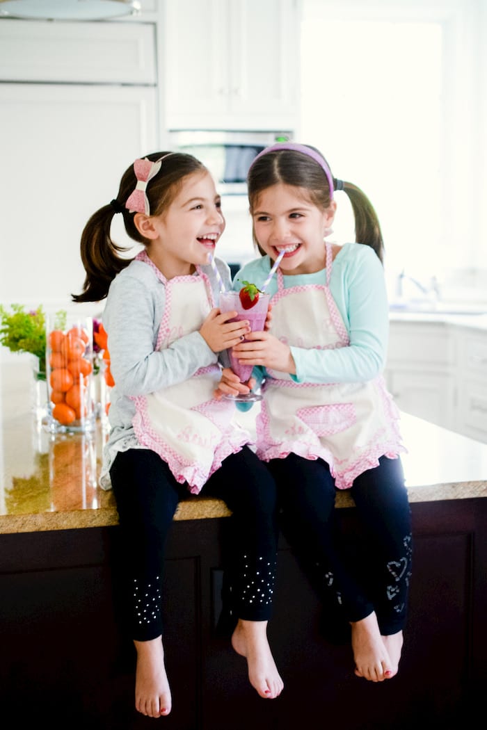 twin girls drinking smoothie kids drinking fruit smoothie