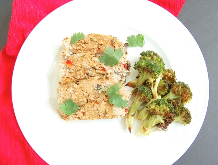 Slice Asian-Style turkey meatloaf and serve with roasted broccoli for an easy weeknight dinner. Asian-style turkey meatloaf sliced on plate with broccoli