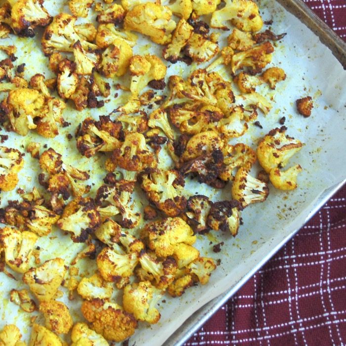 Golden Roasted Cauliflower | Jessica Levinson, MS, RDN, CDN close up of roasted cauliflower with turmeric
