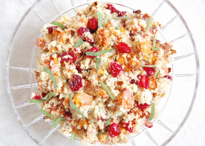 Add a burst of color and flavor to the holiday table with this nutritious and delicious Roasted Butternut Squash and Cranberry Quinoa Salad. Get the vegan and gluten-free recipe at JessicaLevinson.com butternut squash and cranberry quinoa salad is a perfect side dish for your thanksgiving and christmas table